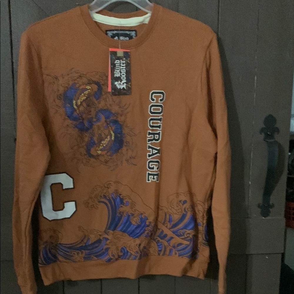 Orange and Blue Crewneck Sweater with Graphic Design